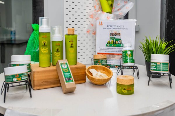 Robust Roots hair care products on display.