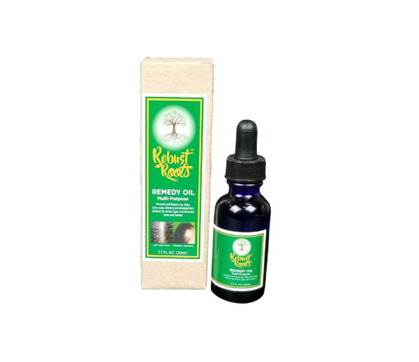 Bottle of REMEDY OIL with dropper next to its packaging.