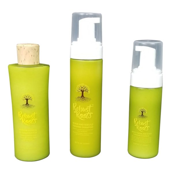 Three robust ROOTS SHAMPOO, CONDITIONER AND LEAVE-IN –CONDITIONER hair care products on a white background.