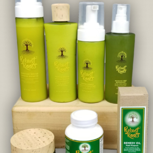 A collection of robust roots haircare products arranged on a wooden stand.